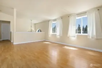 Upper level living room with plenty of natural light