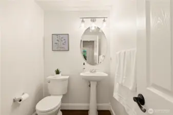 Downstairs powder room. Expand to the Left, and that's where the coat closet is. The plumbing is here to create a shower!