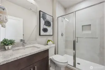 Main floor Bathroom with Shower. Photos are for representational purposes only.  Colors and options may vary.
