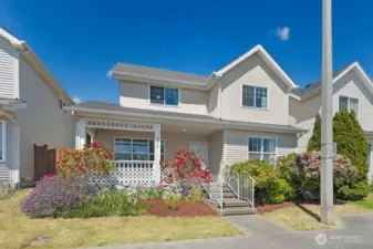 Welcome! Great curb appeal with a covered porch, make it the perfect place to greet guests or relax with your morning coffee.