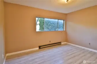Spacious bedroom with new floors.