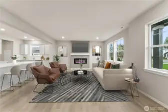 Another view of the family room. Actual home is under construction and materials, colors, and finishes will vary. See site agent for details.