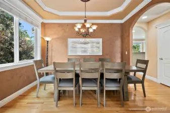 Dining room is spacious and elegant with venetian plaster on the walls, cove ceiling & crown molding  makes this room feel like you are dining in Tuscany.