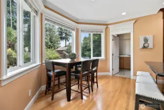 Abundant windows throughout the home bring the outdoors in filling each space with natural light and offering beautiful views of the surrounding landscape.