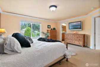 Upstairs is the expansive primary suite featuring elegant crown molding with recessed lighting to create an ambiance and plenty of space to make this your own private retreat.
