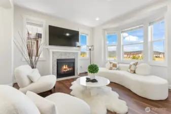 Living room with large west-facing windows.