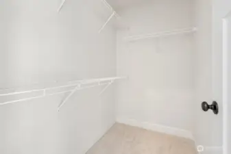 Walk-in closet off primary bedroom.