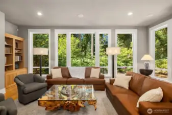 Floor to ceiling windows provide the perfect backdrop for this Northwest wonder
