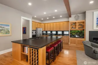 Large kitchen island features seating for 4-6 people