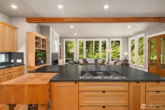 Kitchen faces wide open living area