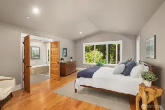 Primary bedroom opens to large primary bath