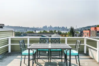 Rooftop deck has sweeping views of the city and Lake Union, perched just above Gas Works Park