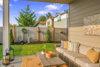Nice sized patio with view out to newly landscaped backyard