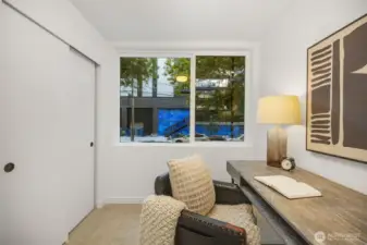 Lower level bedroom staged as office.