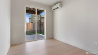 Lower Level Flex/bedroom has access to backyard and covered patio.