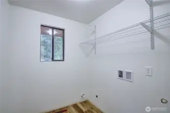 Laundry Room conveniently located between both bedrooms.  Recently updated.