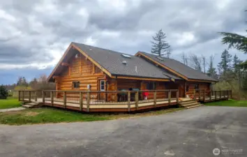 Welcome to 3883 Everett Lane, a beautiful log home with barn, shop and fenced arena and pastures, set on 6+ sunny acres.
