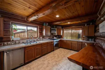 Enjoy the open layout of the kitchen with bar seating