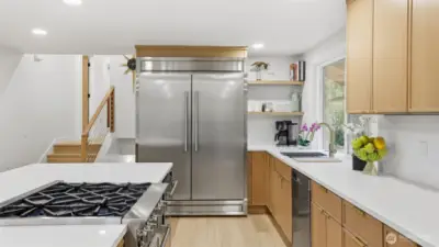 Streamline meal prep in style with a spacious gas cooktop and plenty of storage to keep everything within reach.