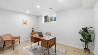 Lower-level guestroom doubles as a cozy office space.