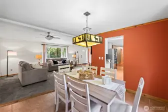 The living room flows effortlessly into the formal dining room