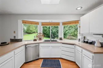 Enjoy the views of the backyard while cooking in the kitchen