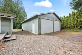 Detached 1440 sqft massive 2-car garage/shop with separate driveway from WindNTide Rd.