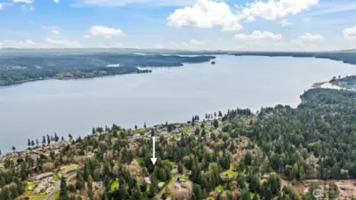 Aerial view of home and WindNTide Community looking south along Henderson Bay & Carr Inlet.