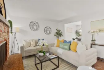 A cozy fireplace anchors the space, making it perfect for relaxing evenings at home. The layout offers a comfortable flow for both daily living and entertaining.