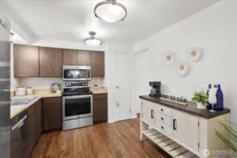 The kitchen offers generous space and a highly functional layout.