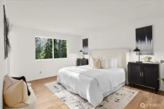 It overlooks the backyard, offering a quiet and private setting. Natural light enhances the space, creating a calming environment.