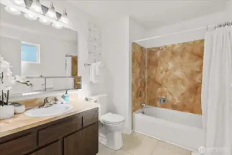 The ensuite bathroom adds convenience and privacy.