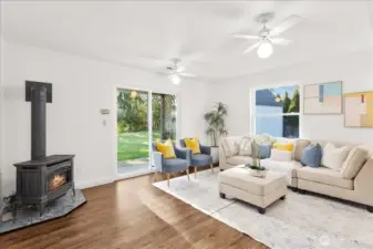 The lower level features a spacious family room with endless possibilities. A sliding glass door provides direct access to the backyard and covered patio.