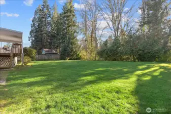 The backyard provides room to garden, play, or simply relax.