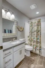 Between bedrooms 2 & 3 you will find the guest bathroom