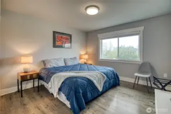 Bedroom 3 with canal and backyard view