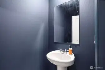 Main-level half bath with sink and toilet (not shown)