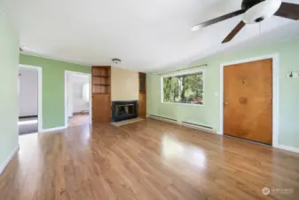 Two bedrooms and a full bath are off of the living room.