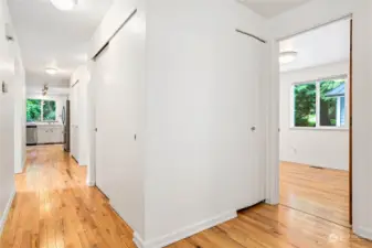Hallway with closets and lots of storage space.