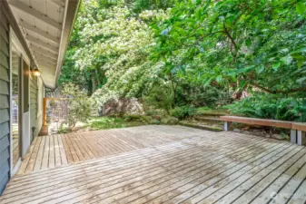 Large back deck to enjoy your quiet parklike backyard.