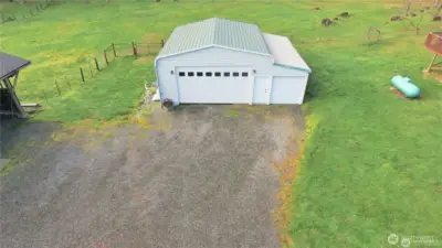 2 garages, 1 barn, 1 shop