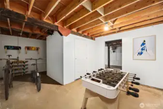 Bike/gear storage, shop, convert to garage and shop or additional living space. Virtually staged photo.