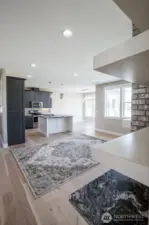 Open living room into Kitchen