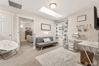 Upstairs you will find this amazing loft with skylight, great office or homework area, also a whole-house fan!