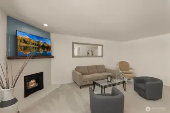 Fireplace has new tile surround, mantle, and new switch with remote control