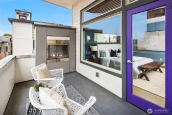 deck of primary with gas fireplace