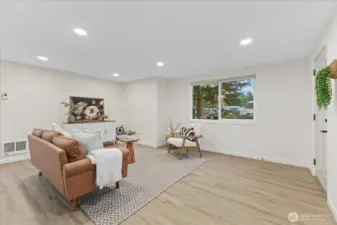 Newer windows in this room with LVP flooring.