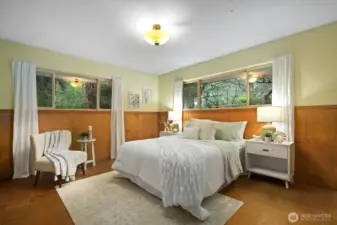 Primary bedroom easily accommodates a king size bed.