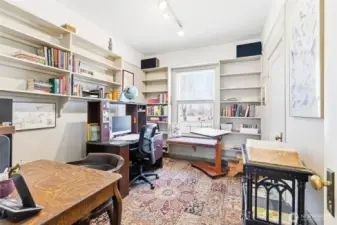 Main level bedroom connects to a bathroom