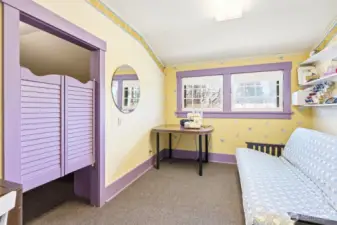 Second upstairs bedroom with saloon doors to the walk-in closet